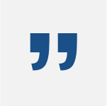 A blue and white image of two quotation marks.